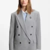 Relaxed-fit blazer with enamel flower brooch