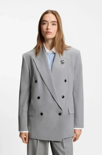 Relaxed-fit blazer with enamel flower brooch