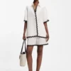 Relaxed-fit blouse with contrast zigzag tape Relaxed-fit blouse with contrast zigzag tape