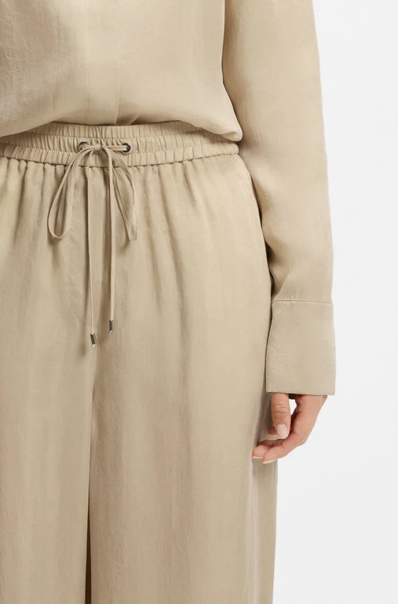 Relaxed-fit trousers with drawcord waist Relaxed-fit trousers with drawcord waist