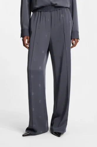 Relaxed-fit trousers with stacked logos