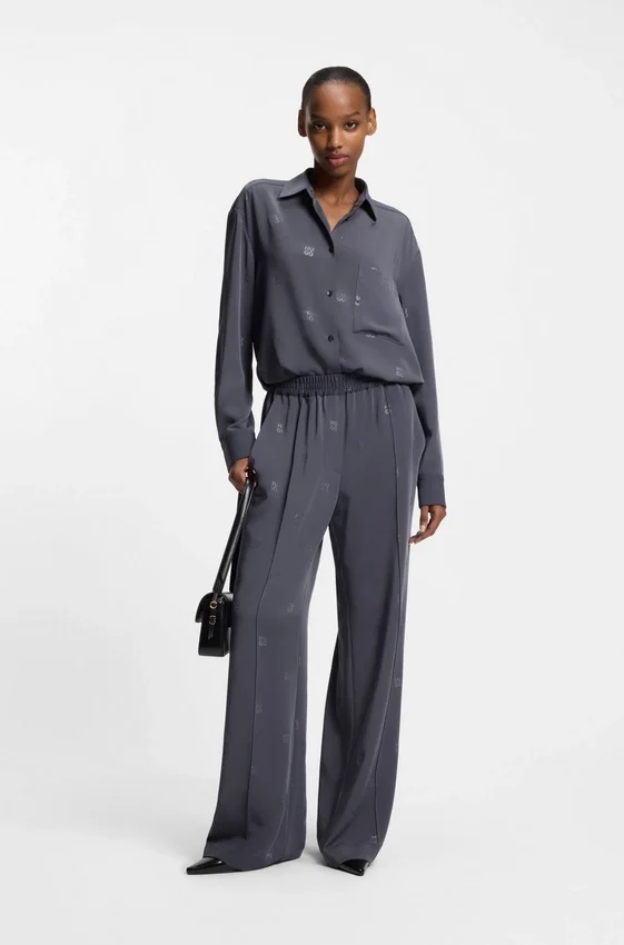 Relaxed-fit trousers with stacked logos Relaxed-fit trousers with stacked logos