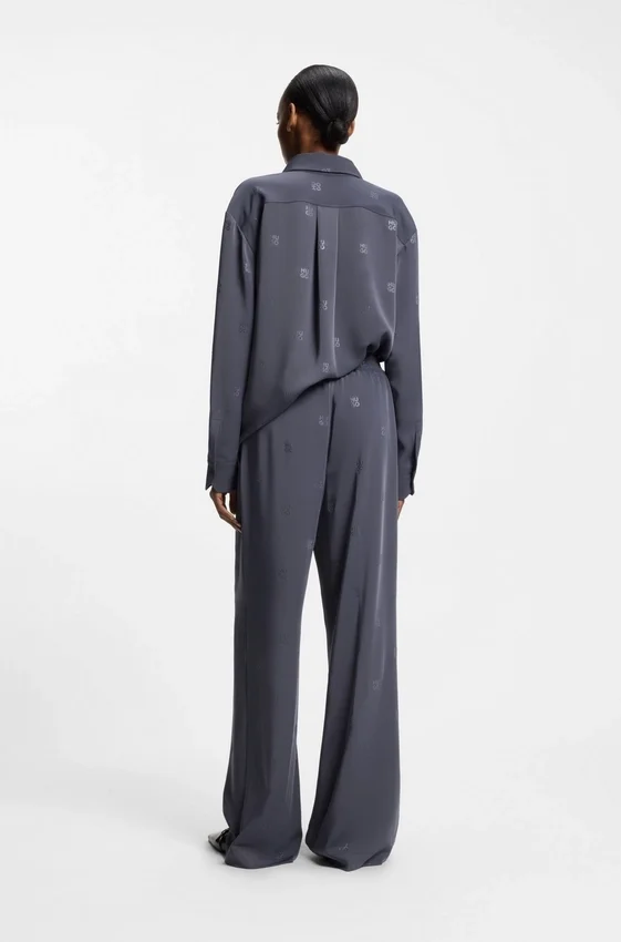 Relaxed-fit trousers with stacked logos Relaxed-fit trousers with stacked logos