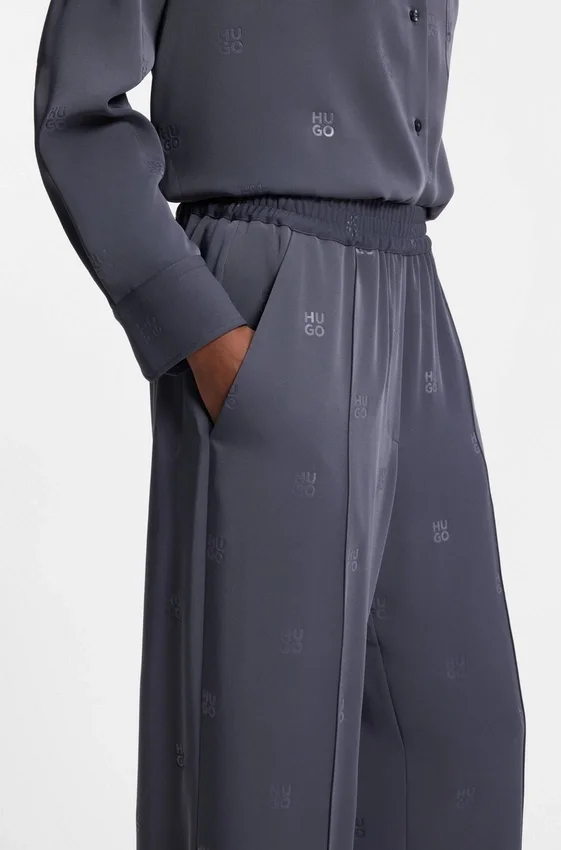 Relaxed-fit trousers with stacked logos Relaxed-fit trousers with stacked logos