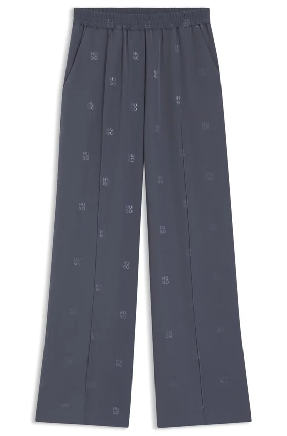 Relaxed-fit trousers with stacked logos Relaxed-fit trousers with stacked logos