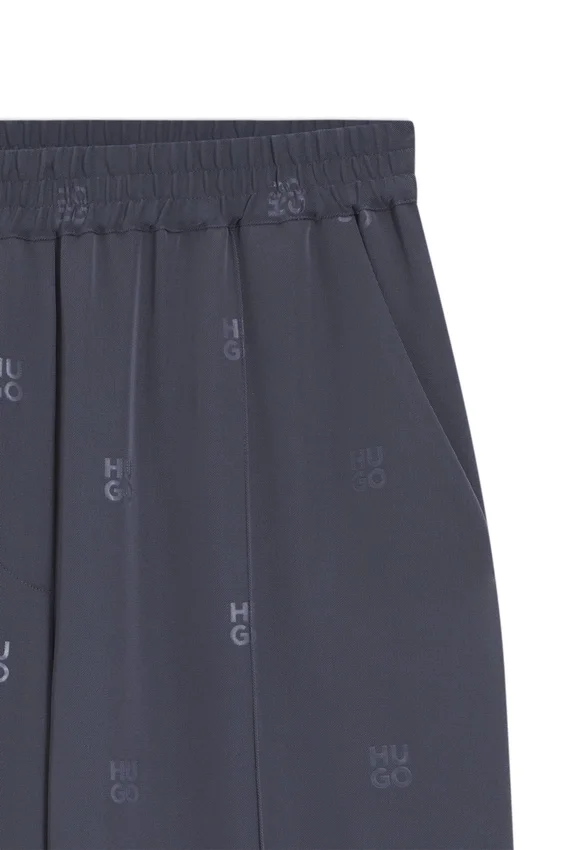 Relaxed-fit trousers with stacked logos Relaxed-fit trousers with stacked logos