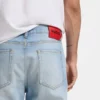 Relaxed-tapered-fit jeans in bright-blue denim Relaxed-tapered-fit jeans in bright-blue denim