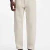 Relaxed-tapered-fit jeans in ecru denim