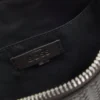 Reporter bag with embossed pattern