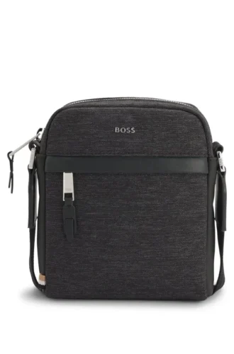Reporter bag with leather trims