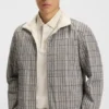 Reversible checked jacket with water-repellent finish