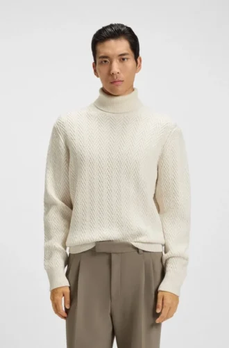 Rollneck sweater in herringbone virgin wool