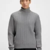 Rollneck sweater in herringbone virgin wool