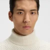 Rollneck sweater in herringbone virgin wool