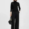 Rollneck sweater in merino wool