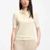 Short-sleeved sweater in merino wool with polo collar