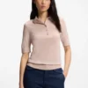 Short-sleeved sweater in merino wool with polo collar