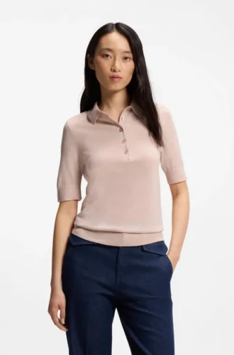 Short-sleeved sweater in merino wool with polo collar