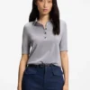 Short-sleeved sweater in merino wool with polo collar