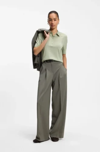 Short-sleeved sweater in merino wool with polo collar