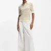 Short-sleeved sweater in merino wool with polo collar