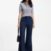 Short-sleeved sweater in merino wool with polo collar