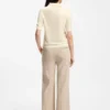 Short-sleeved sweater in merino wool with polo collar