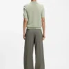 Short-sleeved sweater in merino wool with polo collar