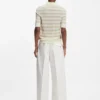 Short-sleeved sweater in merino wool with polo collar