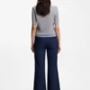 Short-sleeved sweater in merino wool with polo collar