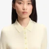 Short-sleeved sweater in merino wool with polo collar