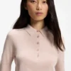 Short-sleeved sweater in merino wool with polo collar