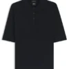 Short-sleeved sweater in merino wool with polo collar