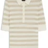 Short-sleeved sweater in merino wool with polo collar