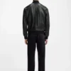Sleeve-pocket bomber jacket in leather