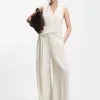 Sleeveless blouse in sandwashed silk with V neckline