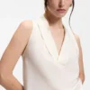 Sleeveless blouse in sandwashed silk with V neckline