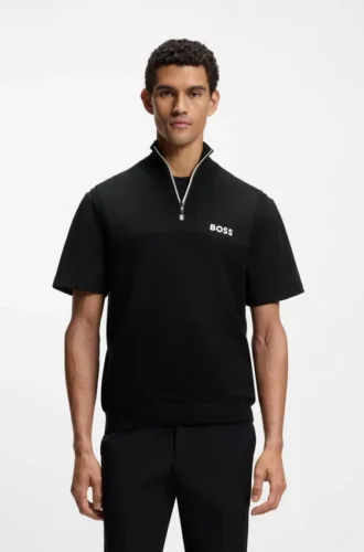 Sleeveless cotton-blend sweater with zip neck