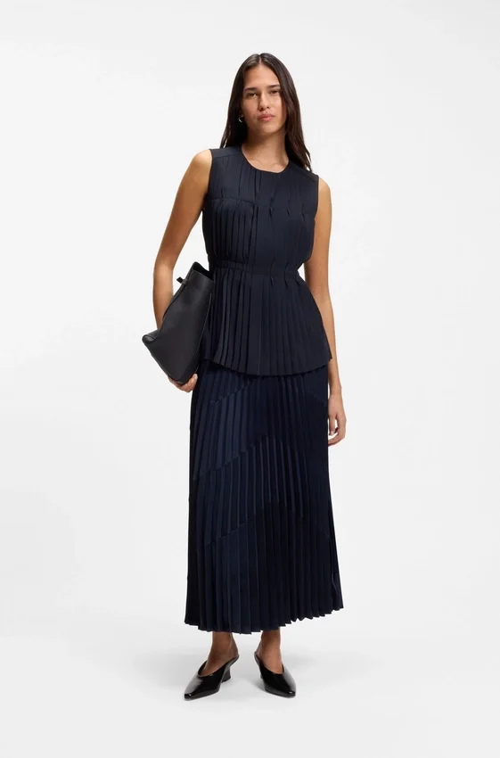 Sleeveless crepe blouse with pleats Sleeveless crepe blouse with pleats