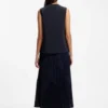 Sleeveless crepe blouse with pleats Sleeveless crepe blouse with pleats