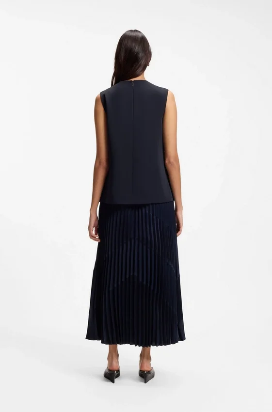 Sleeveless crepe blouse with pleats Sleeveless crepe blouse with pleats
