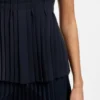 Sleeveless crepe blouse with pleats Sleeveless crepe blouse with pleats