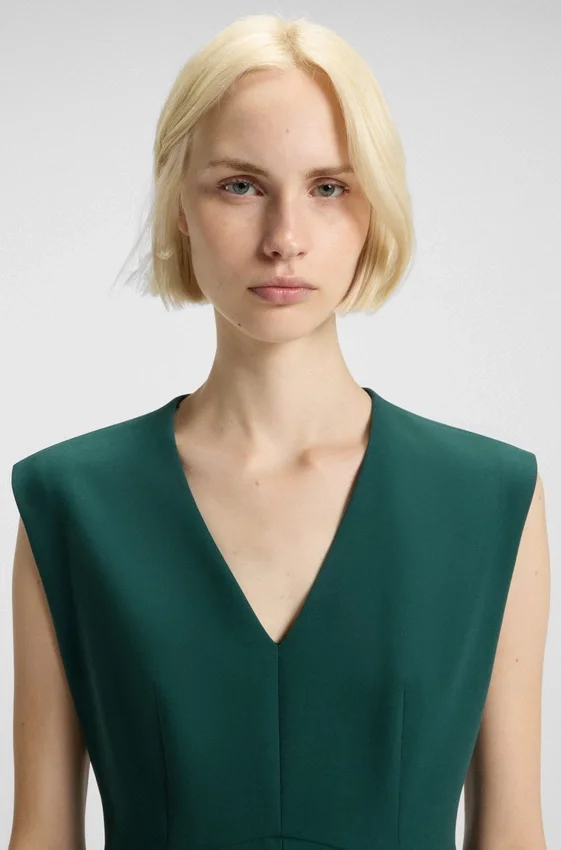 Sleeveless dress with front pleat Sleeveless dress with front pleat