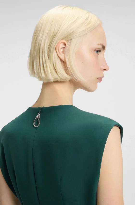 Sleeveless dress with front pleat Sleeveless dress with front pleat