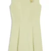 Sleeveless dress with gold-tone flower brooch Sleeveless dress with gold-tone flower brooch