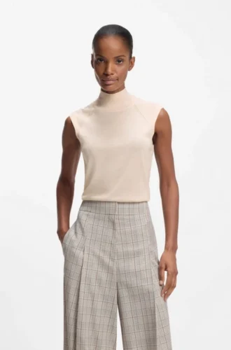 Sleeveless mock-neck sweater in merino wool
