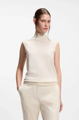 Sleeveless mock-neck sweater in merino wool