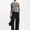 Sleeveless mock-neck sweater in merino wool