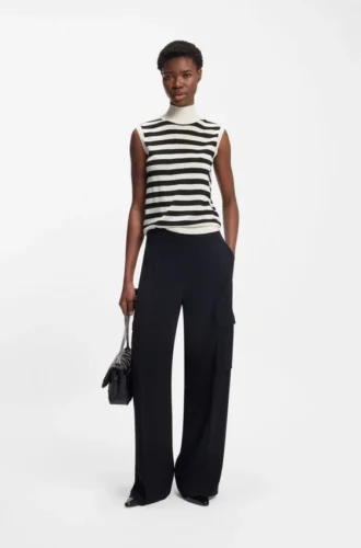 Sleeveless mock-neck sweater in merino wool