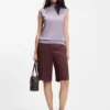 Sleeveless mock-neck sweater in merino wool